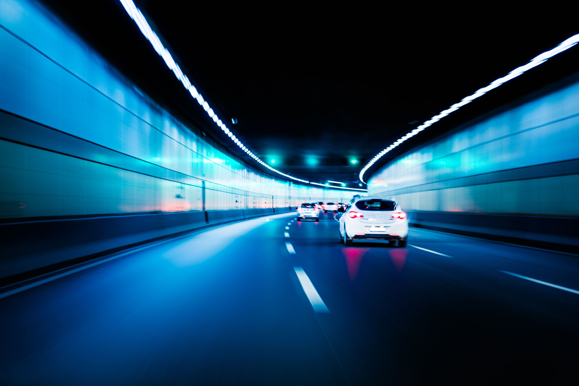 Blurry chromatic color tunnel car traffic motion blur. Motion blur visualizies the speed and dynamics.