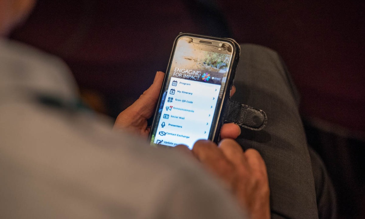 Audience member looks at EFI app