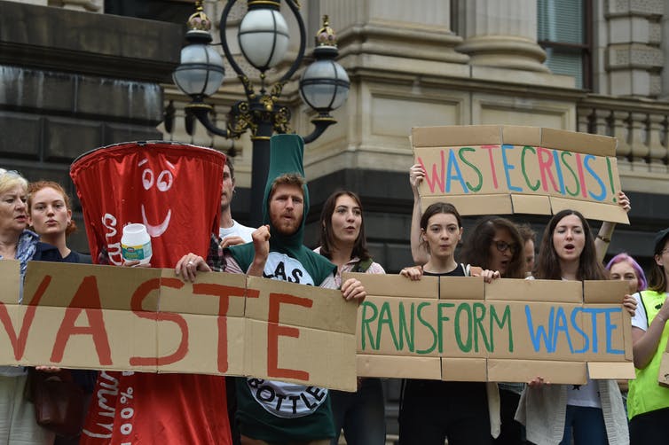 The waste crisis in Victoria prompted a protest on the steps of parliament against recyclable materials going into landfill last year. James Ross/AAP