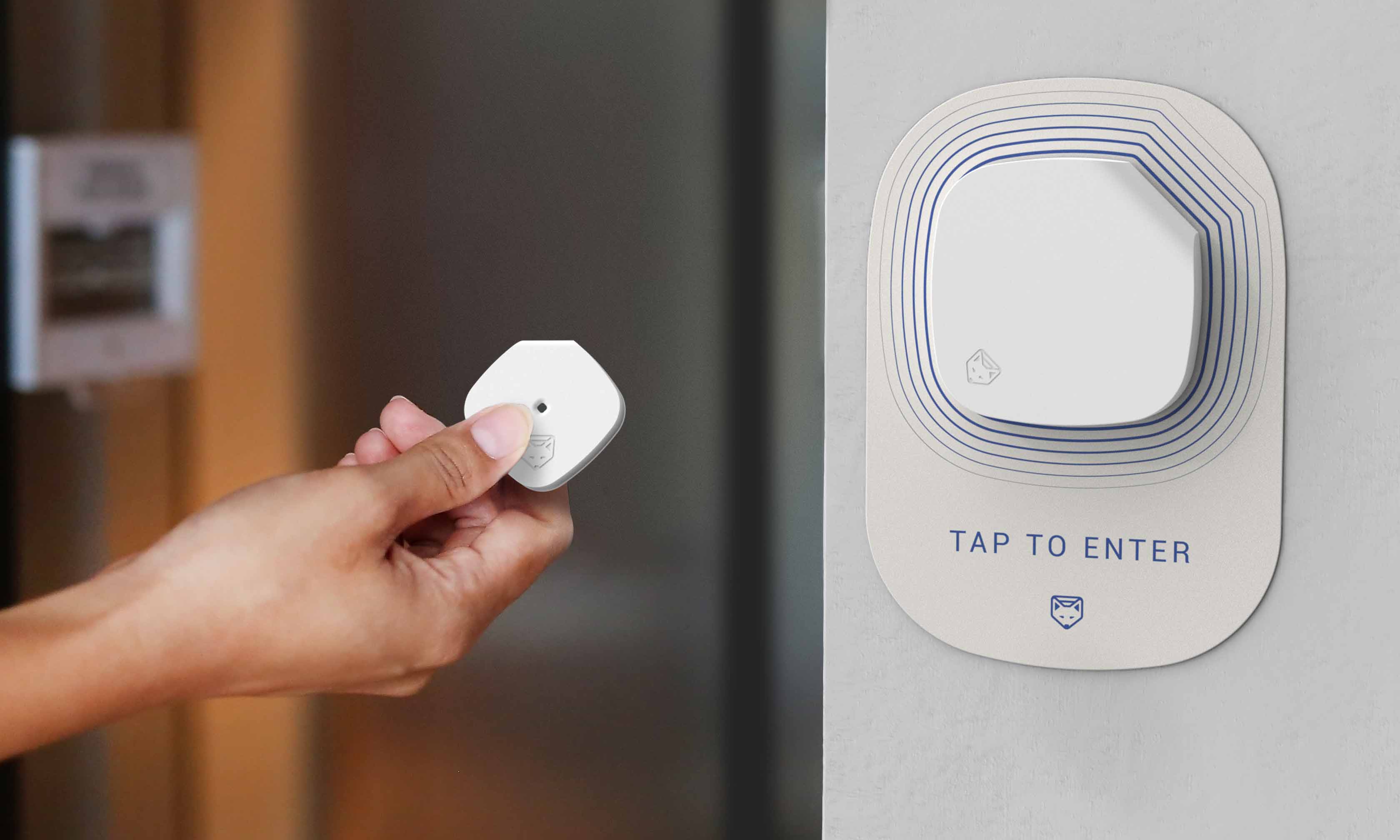 Concept image showing someone holding a fob to a covid sensor