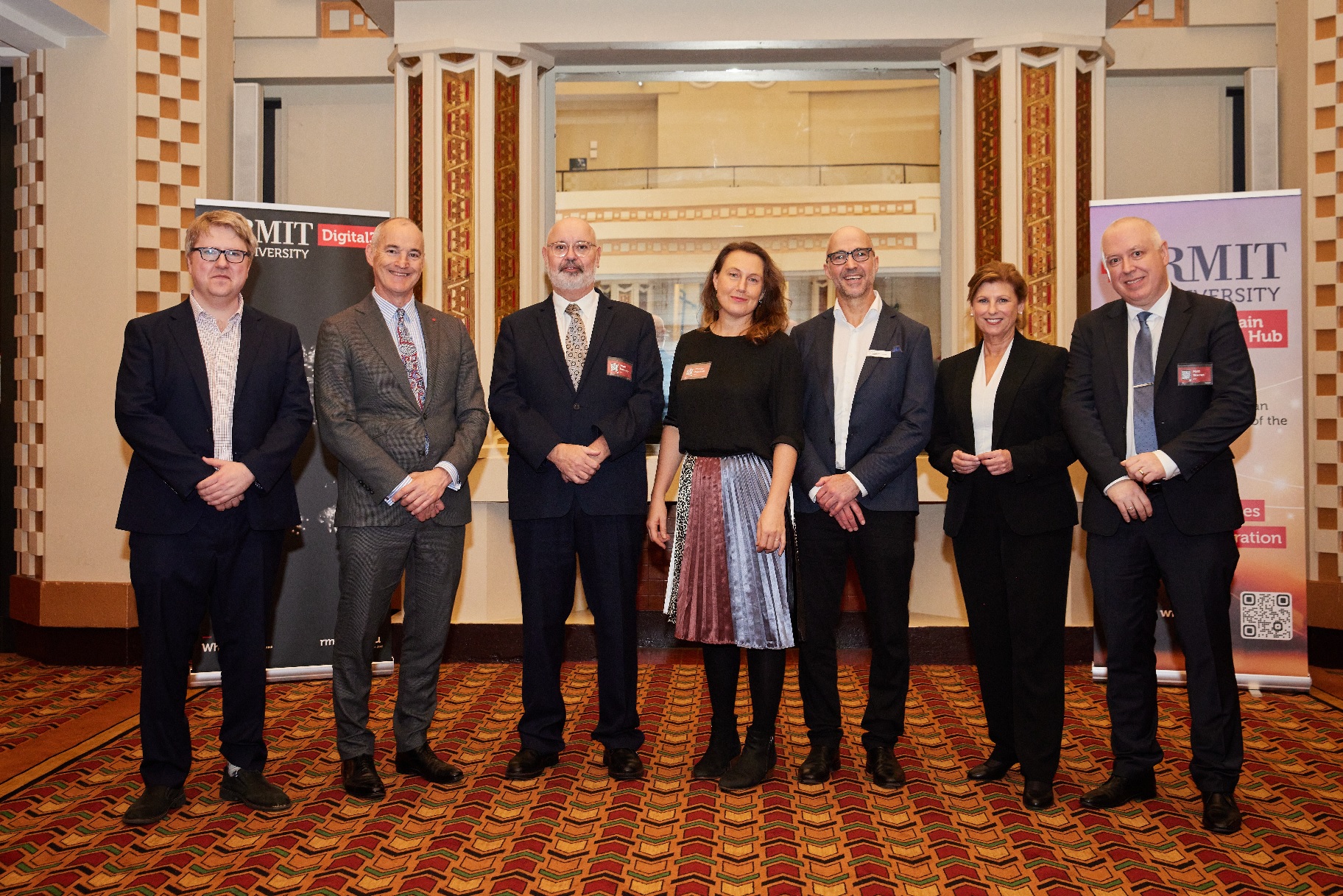 The Digital 3 team stands in group with Vice Chancellor Alec Cameron