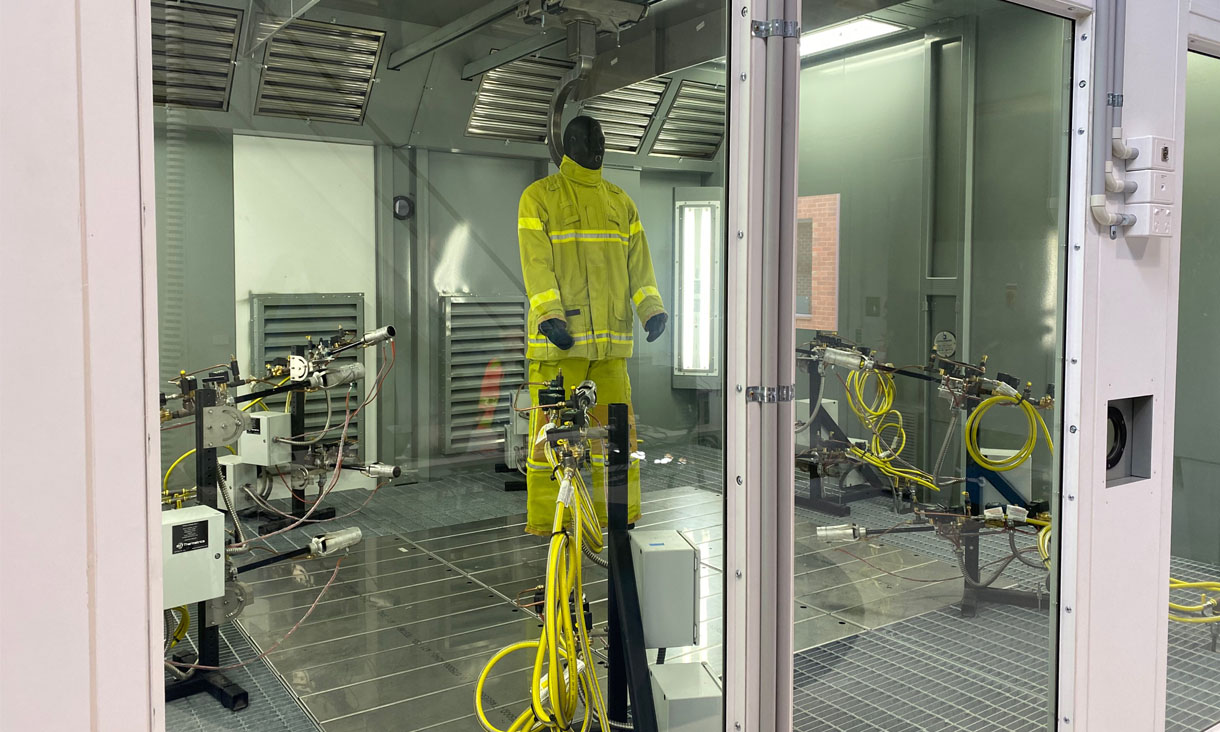 A fire-proof mannequin inside the insulated steel chamber.