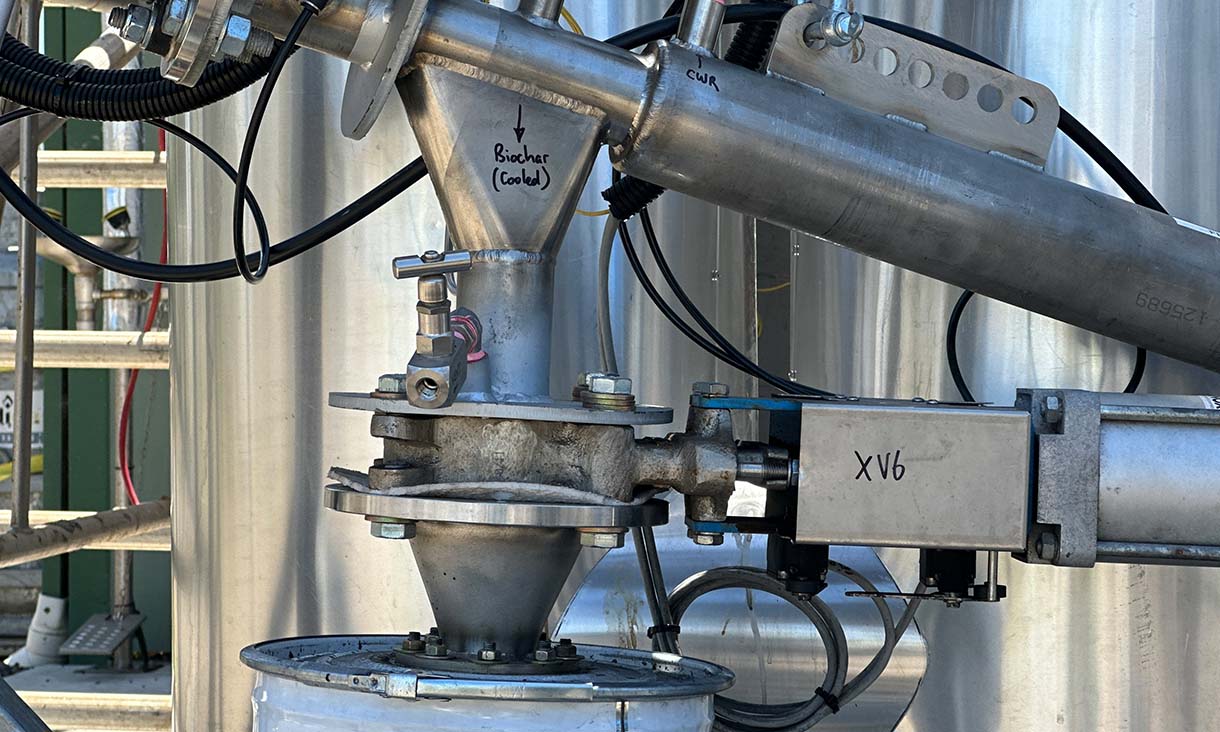 The Australian-made innovation uses high temperatures without oxygen to make a carbon-rich product called biochar, which can be used in carbon electrodes for batteries and other advanced energy storage devices or can act as a fertiliser or soil amendment. Credit: Seamus Daniel, RMIT University