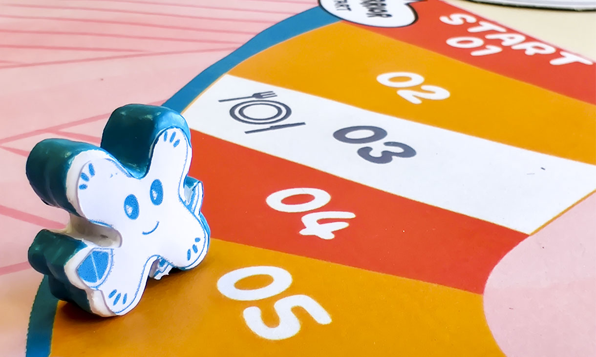 A friendly Meeple on the board game.