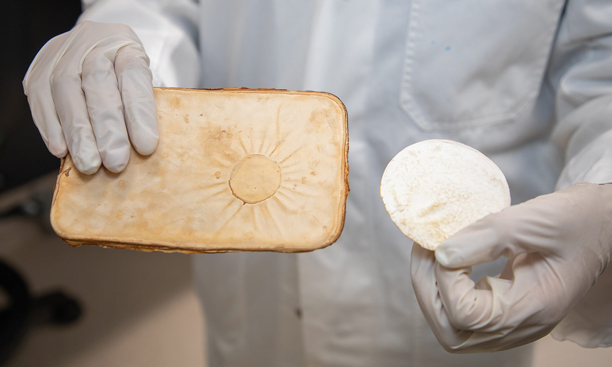 Chulikavit shows off the compressed mycelium sheets she created for the project.