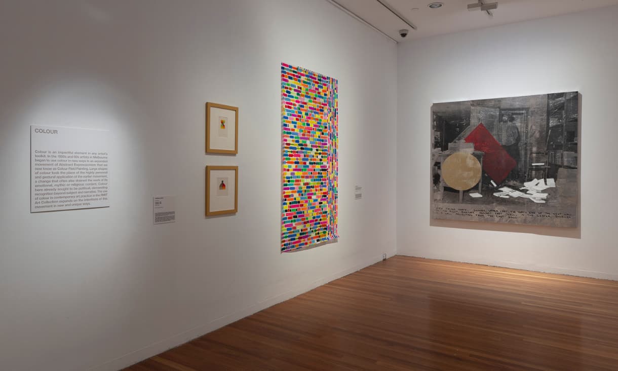 A room with paintings and prints