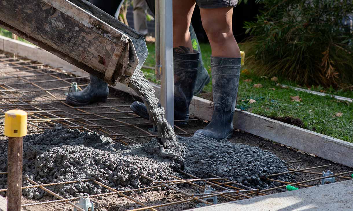 The first pour of the coffee concrete for the footpath trial in Gisborne. Credit: Carelle Mulawa-Richards, RMIT University