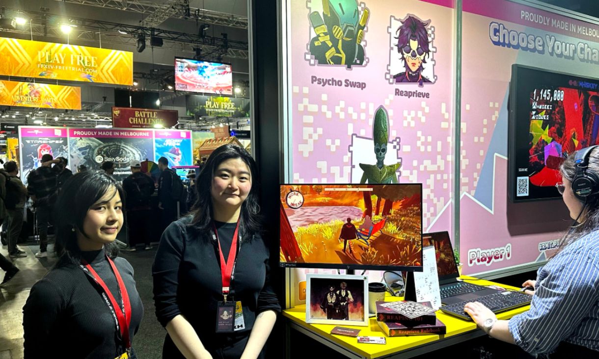Students at one of RMIT’s stalls at PAX.