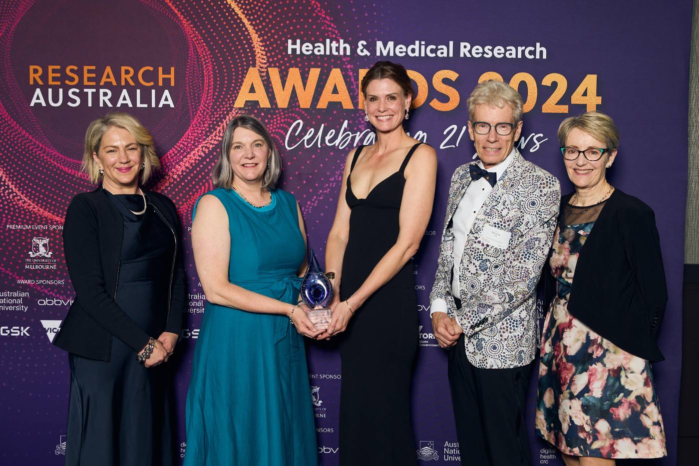 Receiving the Digital & Data Health Innovation award from Research Australia. (l-r) Clare Russell (RMIT), Professor Karin Verspoor (RMIT), Dr Jennifer Beer (Telstra Health), Professor Nick Fisk (Research Australia), Isobel Frean (DHCRC). 