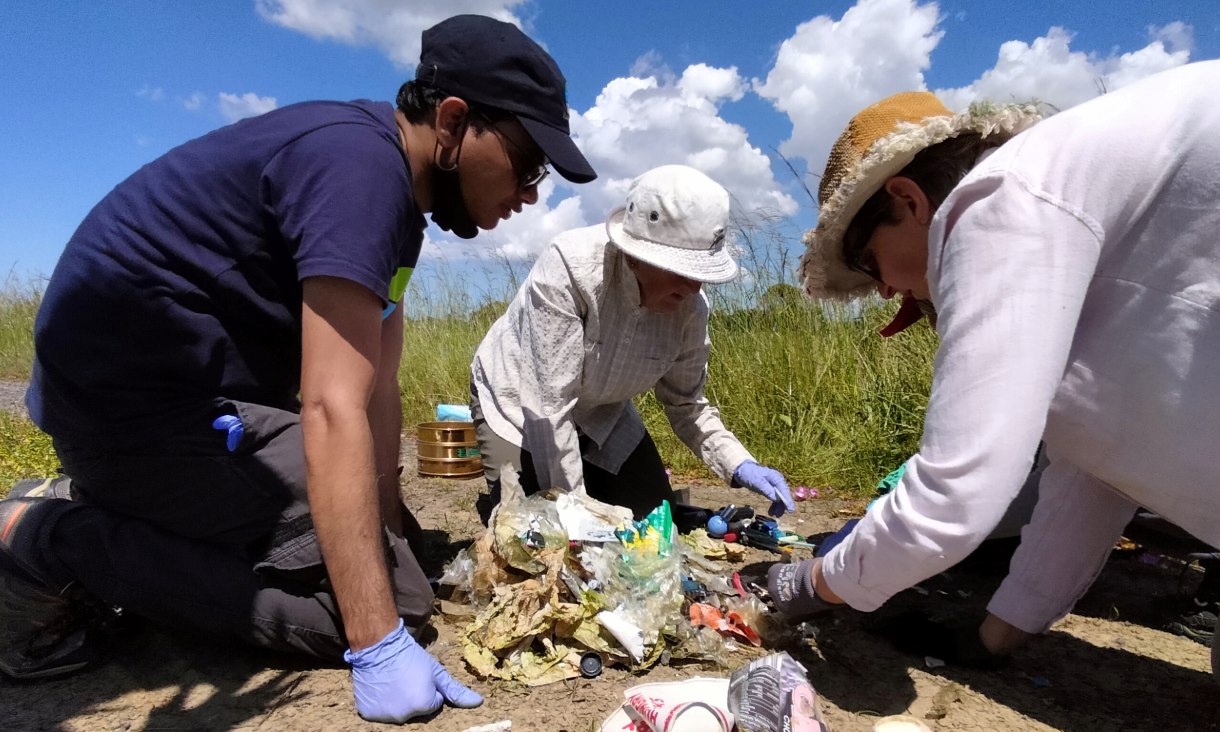Dr Tanveer Adyel from RMIT University working with citizen scientists to monitor microplastics at a wetland. Credit: supplied by the research team