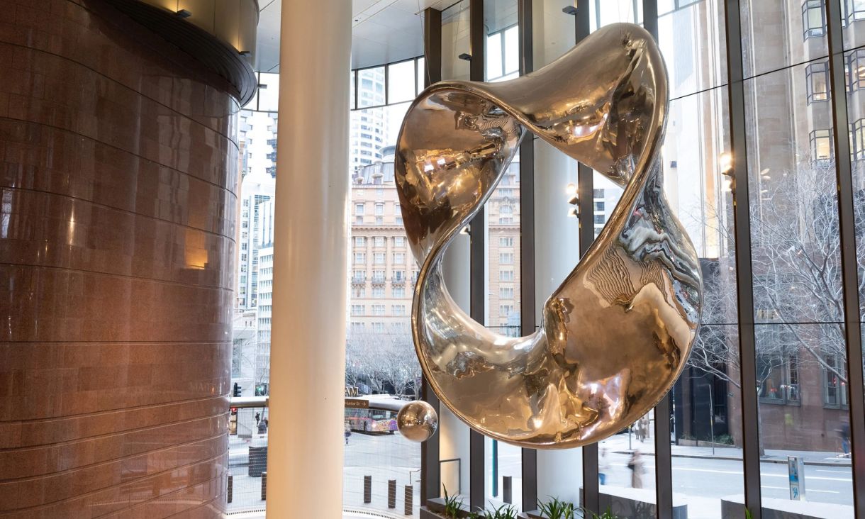 Mikala Dwyer, Continuum, 2024, polished stainless steel, 6.4 x 2m.