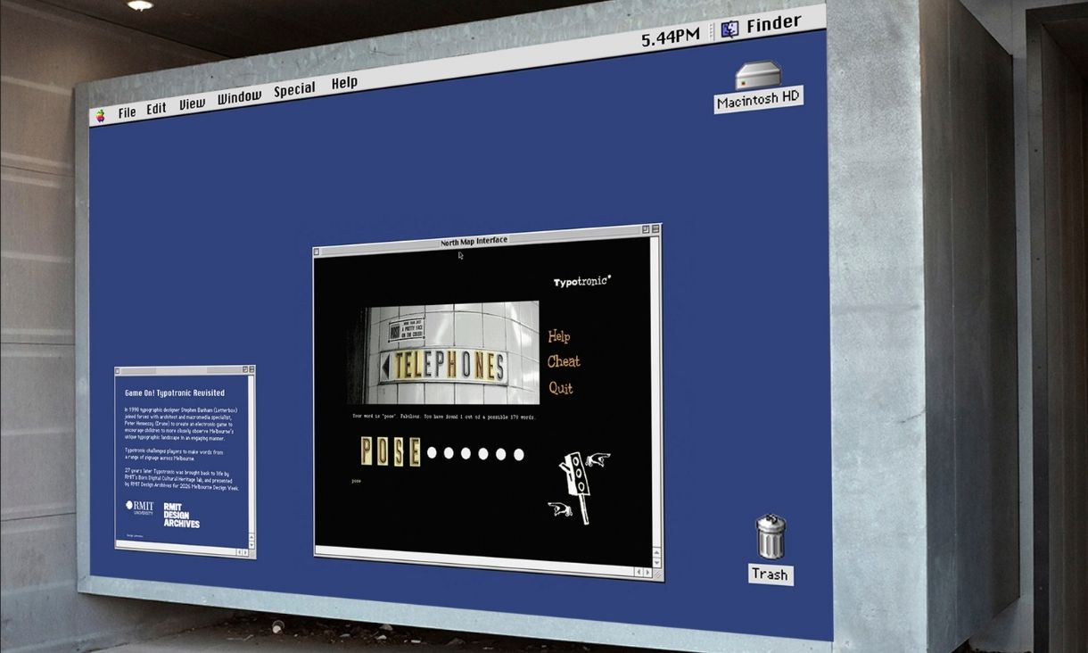 A wall is changed to look like an old mac computer desktop, there is a pop-up which says 'telephones'.