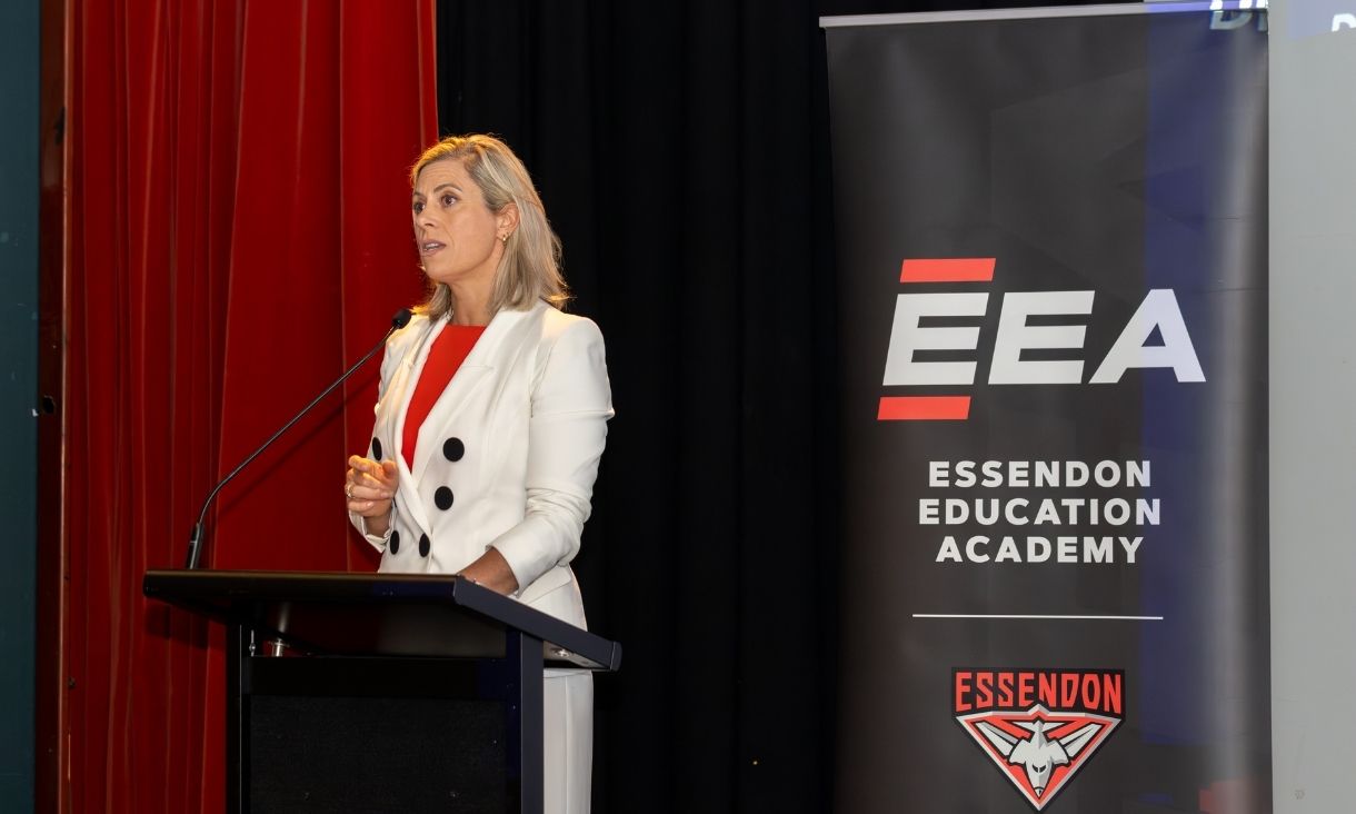 Bridie O'Donnell presenting at lectern.