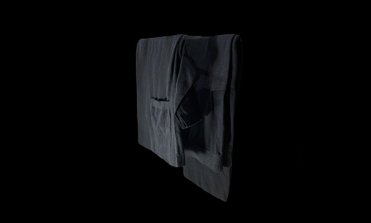 dark srubs are pictured against a dark background