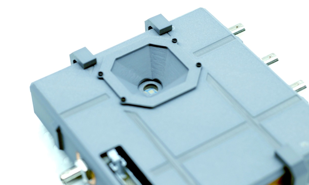 Close-up of the exterior of a laboratory neuromorphic vision prototype.