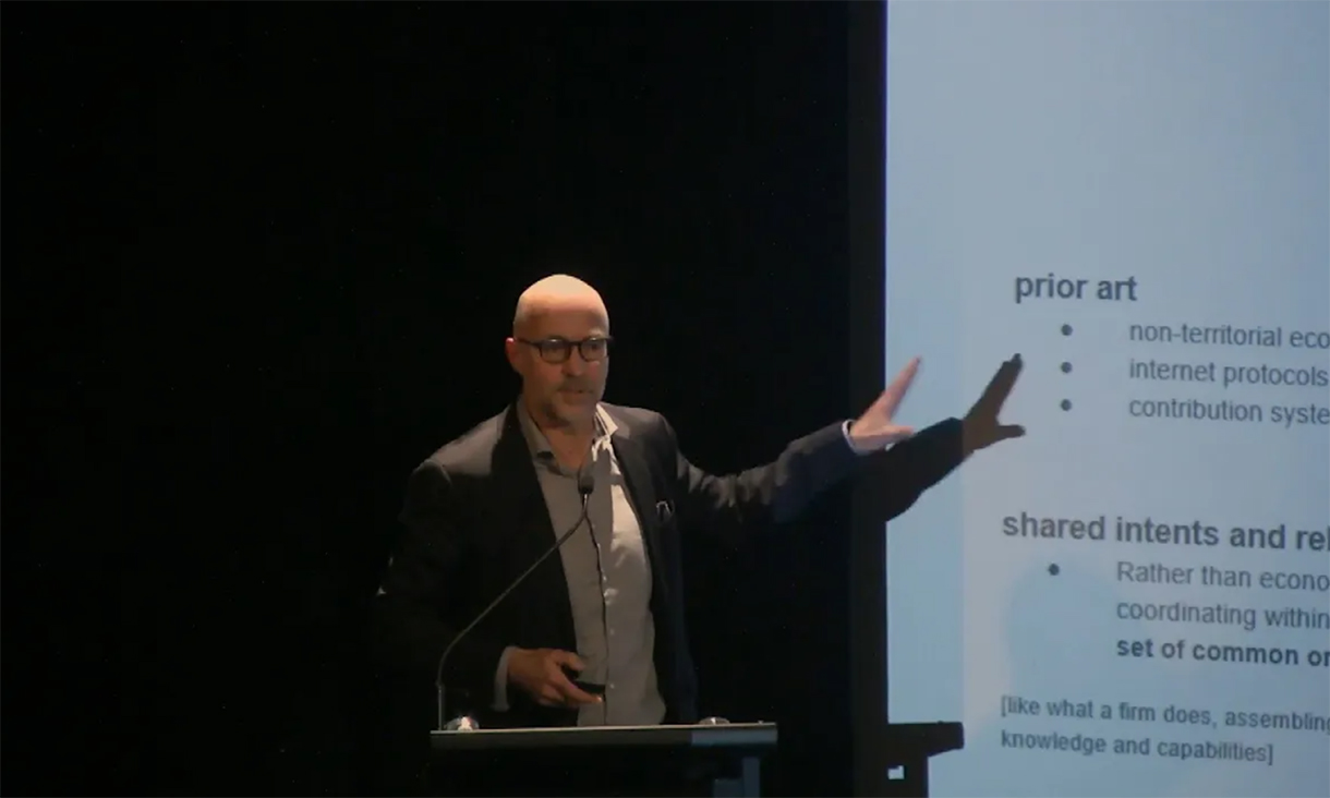 Distinguished Professor Jason Potts giving lecture