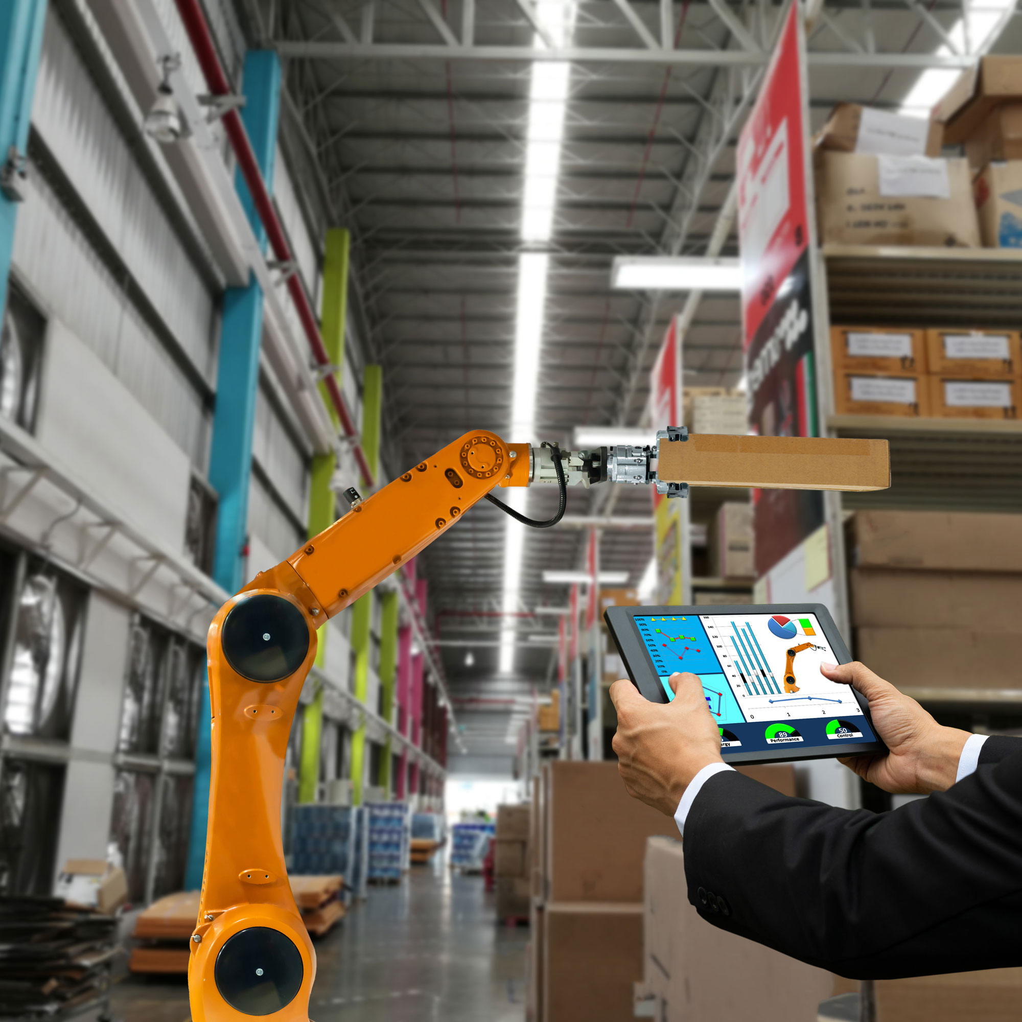 Image of a robot moving boxes in a warehouse