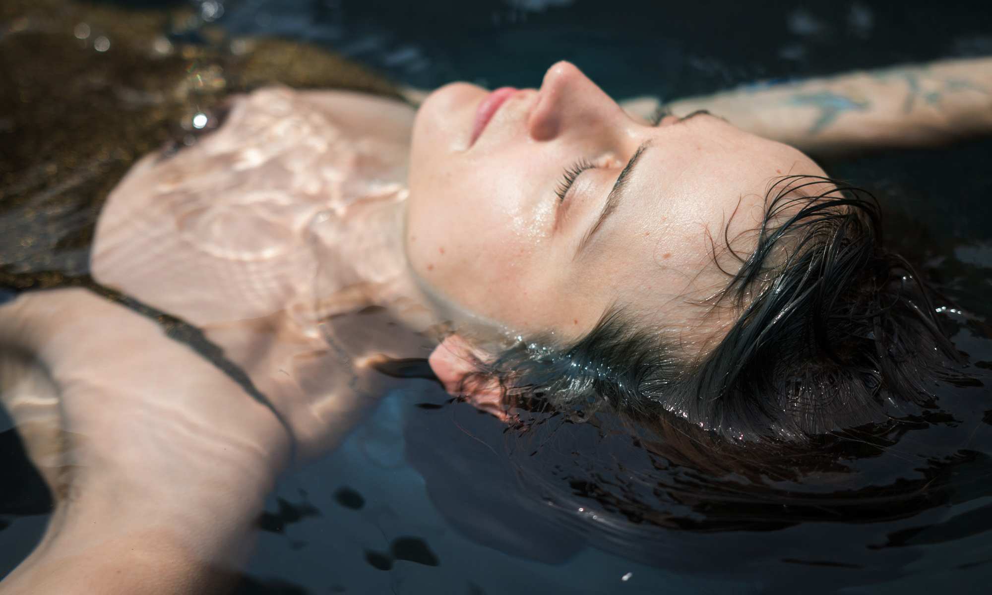Art installation showing a film still of an underwater sound installation. 