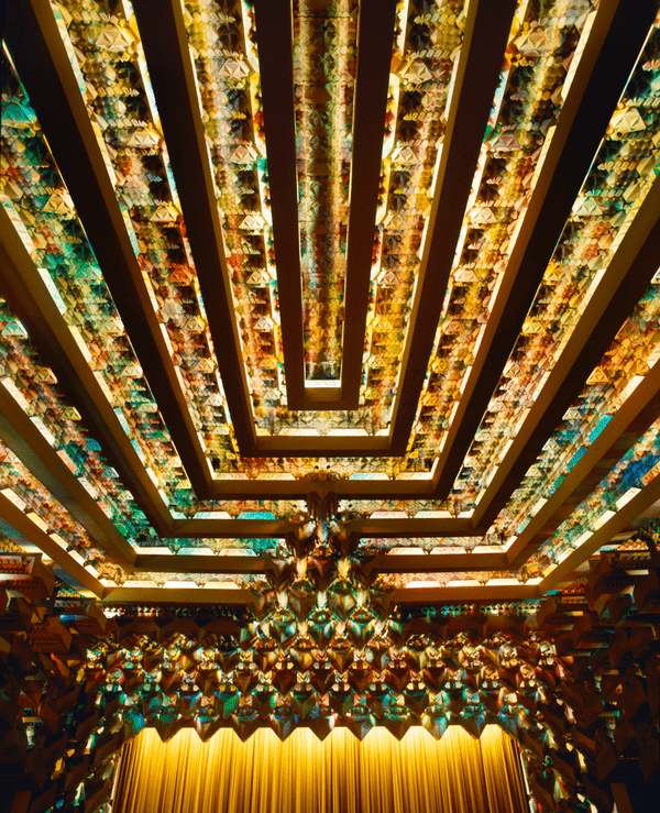 A photo of The Capitols ceiling lit up with coloured lights
