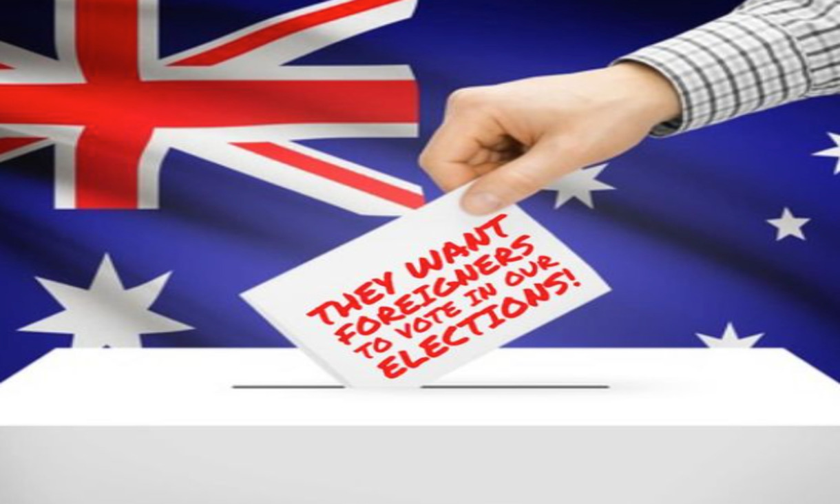 man's hand placing ballot reading 'They Want Foreigners to Vote in Our Elections' into a ballot box against background of Australian flag