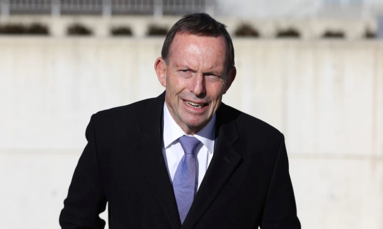 former prime minister Tony Abbott in with purple tie and black jacket