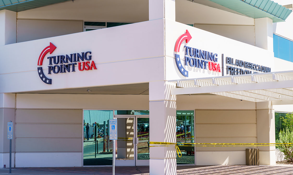 A Turning Point USA office whose door has been taped off with yellow tape