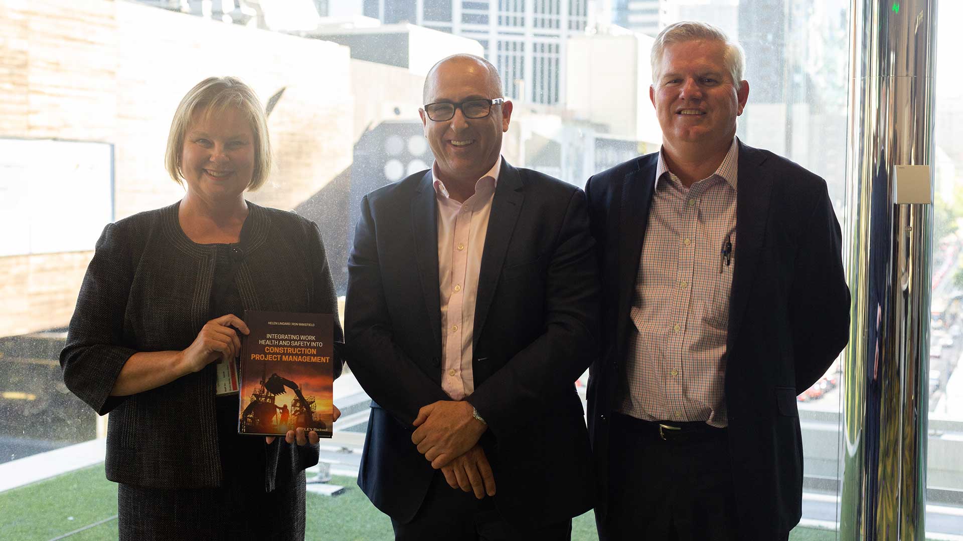 Dist. Prof. Helen Lingard, Corey Hannett (Director General of Victoria’s Major Transport Infrastructure Authority) and Prof. Ron Wakefield at the launch of ‘Integrating Work Health and Safety into Construction Project Management’ in November 2019. 