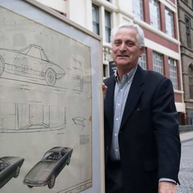Phillip Zmood with one of his donated car sketches