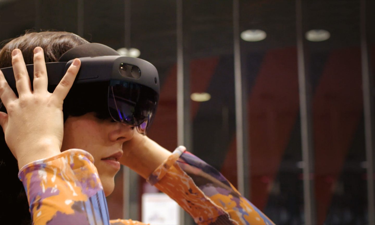 Female student wearing VR headset