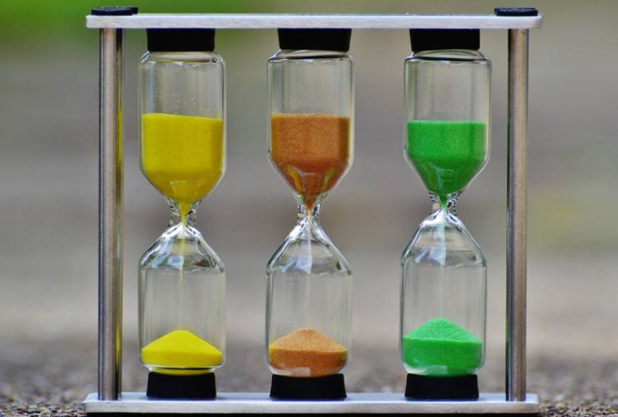 Three hour-glass clocks showing that there is still time.