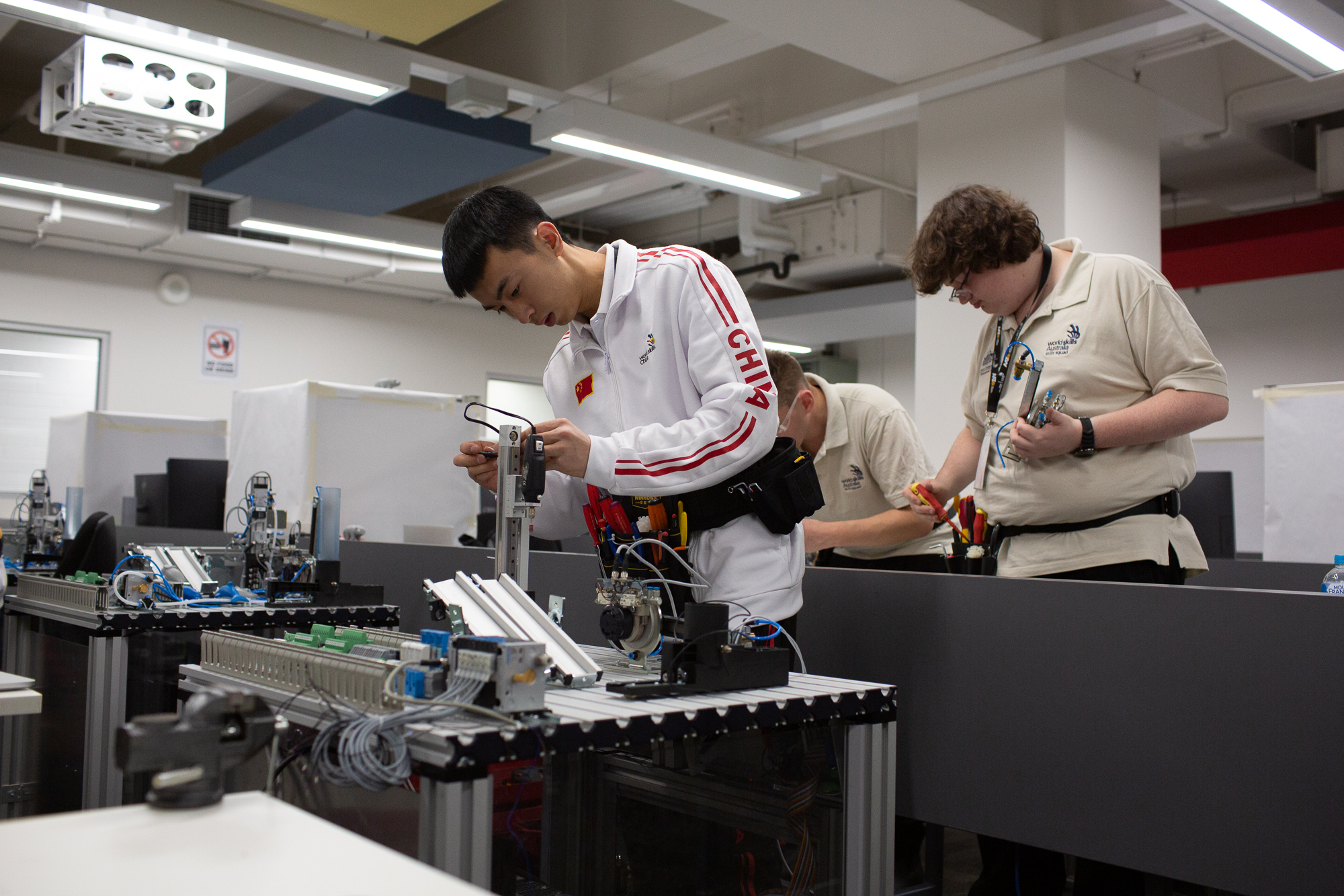 RMIT and international competitors at the 2019 GlobalSkills Challenge mechatronics event