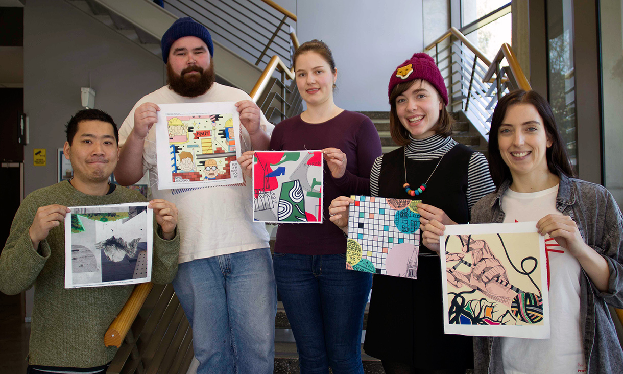 Textile students holding their winning cushion designs