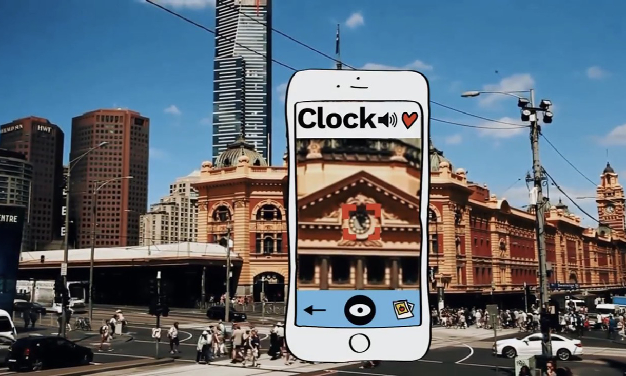 Phone with the background of Flinders station in Melbourne
