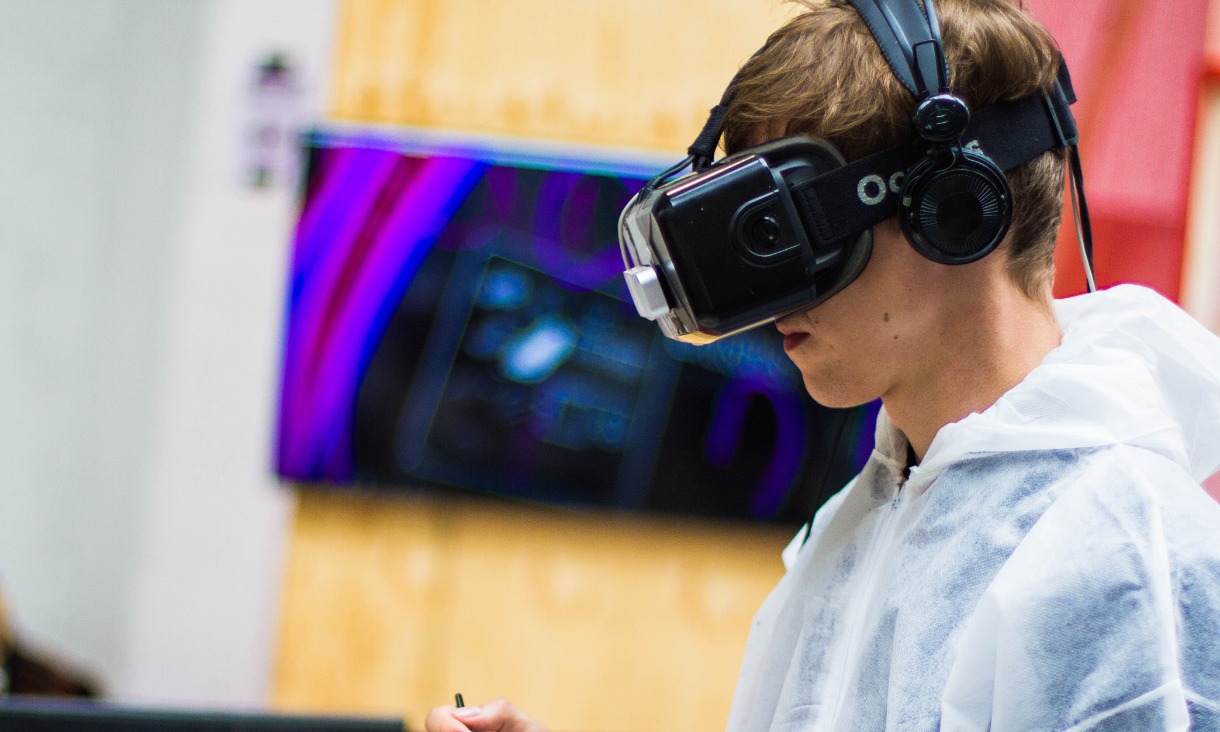 Student using VR headset.