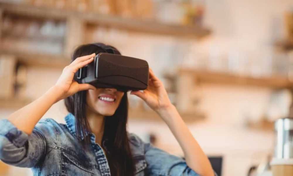Person smiling and wearing VR headset