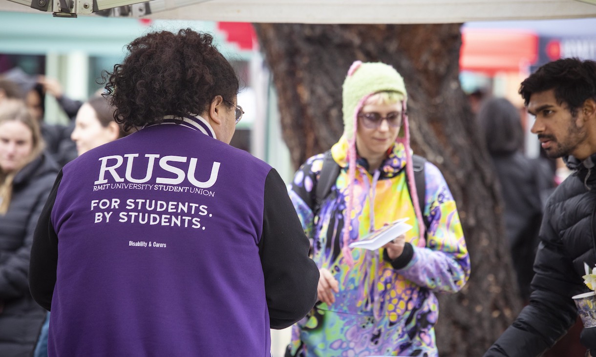 RUSU student representative at an event.