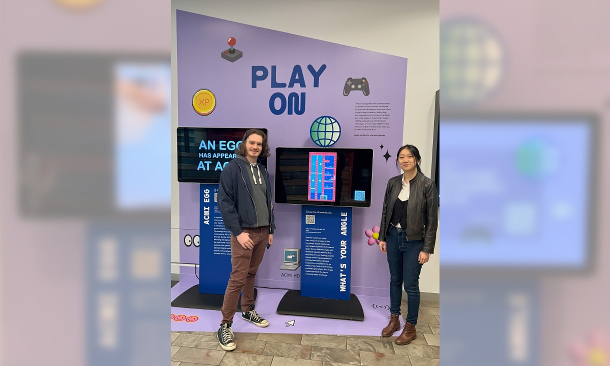 RMIT students, Callum Chatfield (left) and Mally He (right), with their microgame What’s Your Angle.
