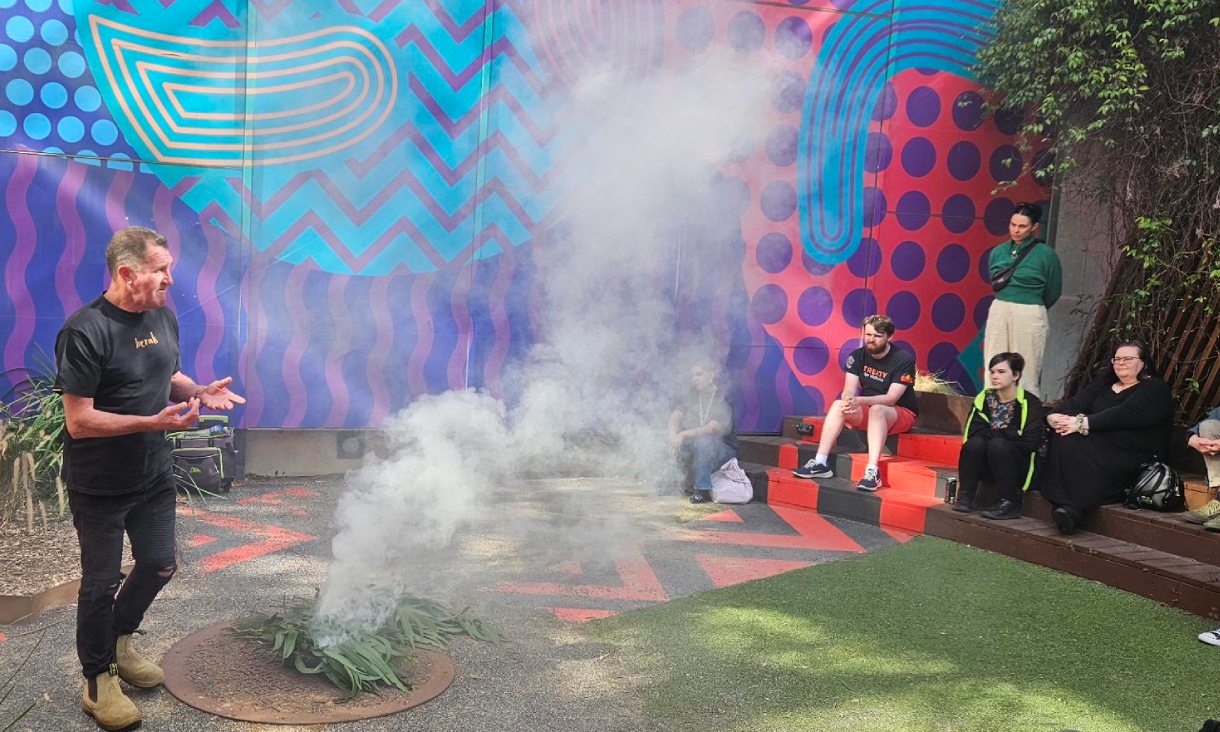 People attending smoke ceremony