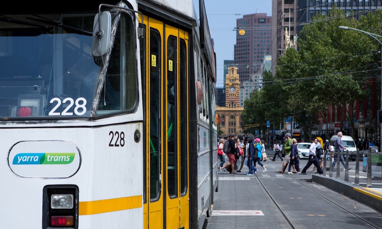 A Melbourne tram travels near Flinders Street Station.