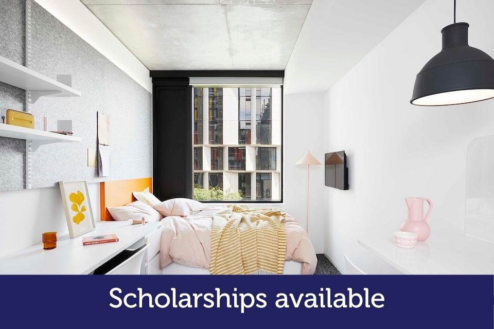 Bright room with a bed and desk