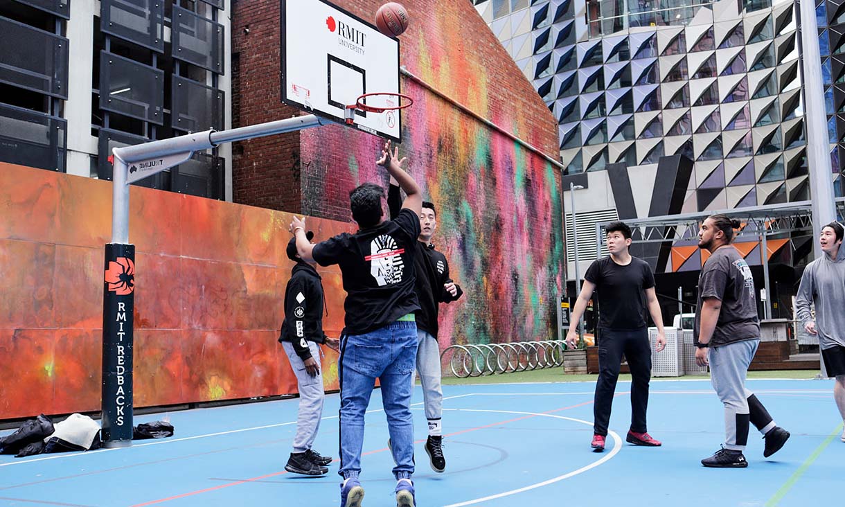 RMIT students playing basketball