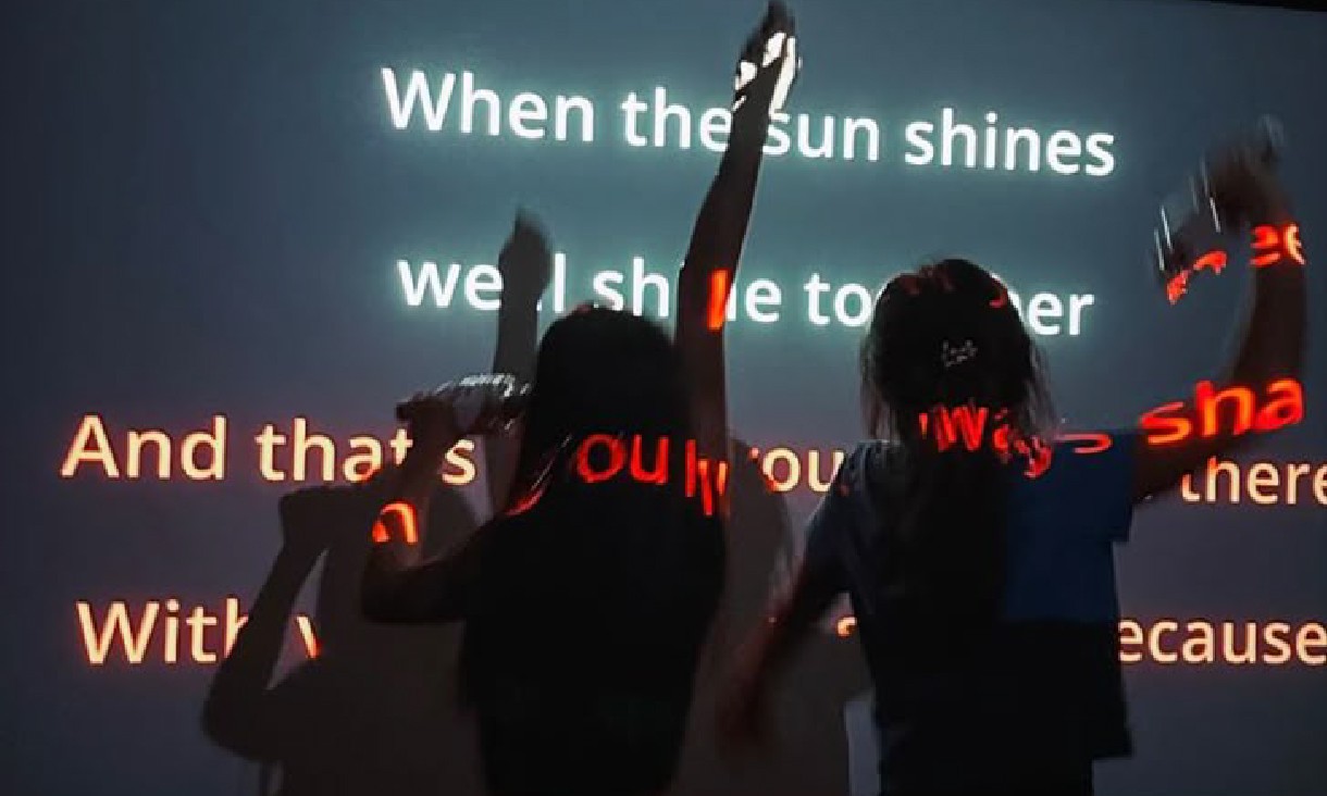 Students singing karaoke