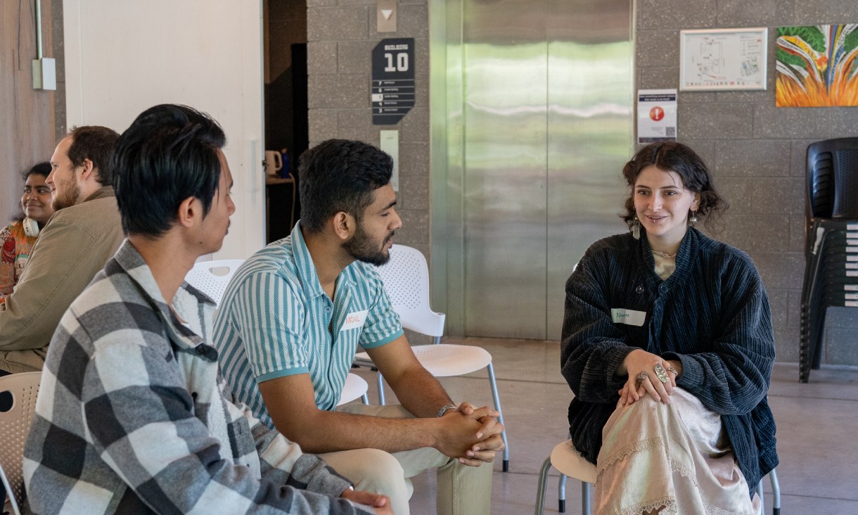 RMIT students sit together at the RMIT Plus end of year celebration