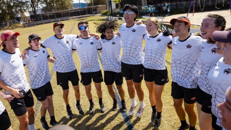 Sports team standing in circle