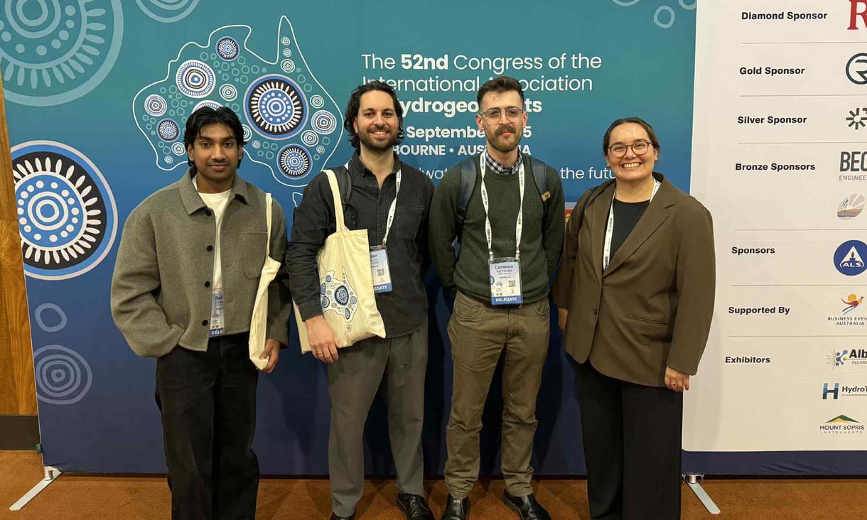 Sahas and his group presenting at an engineering conference