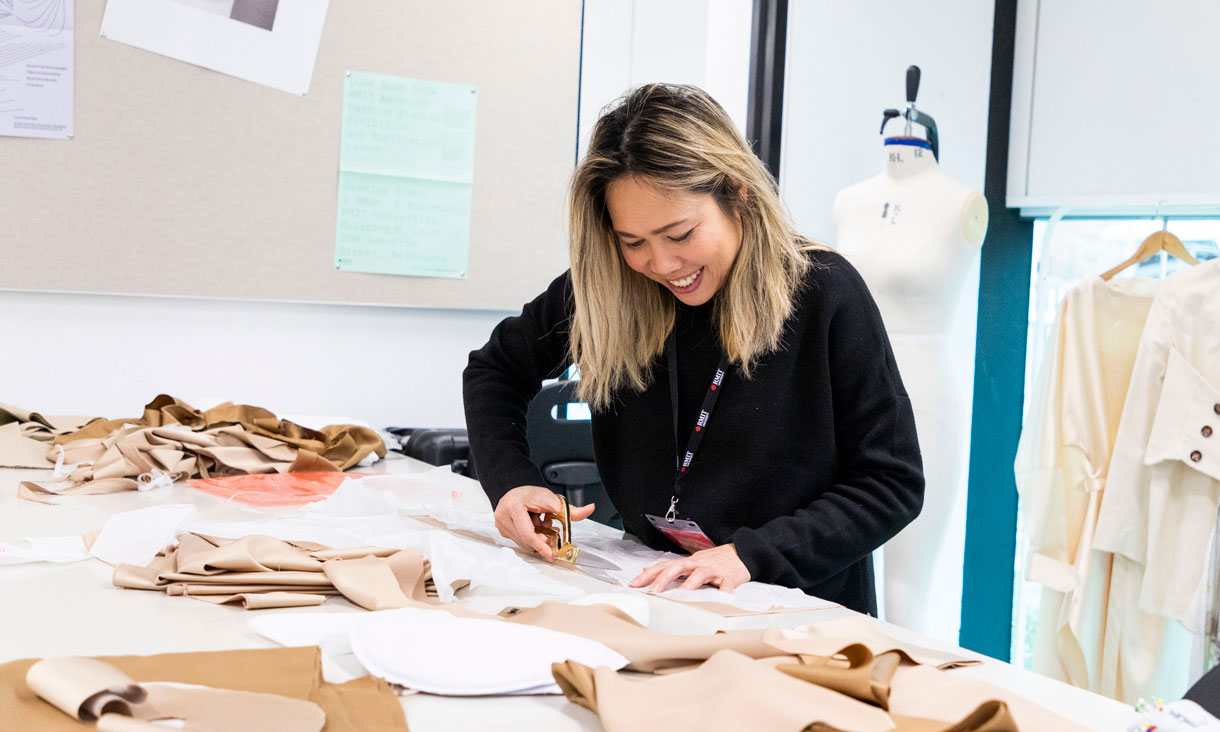 Cutting fabric in RMIT Brunswick fashion design studio
