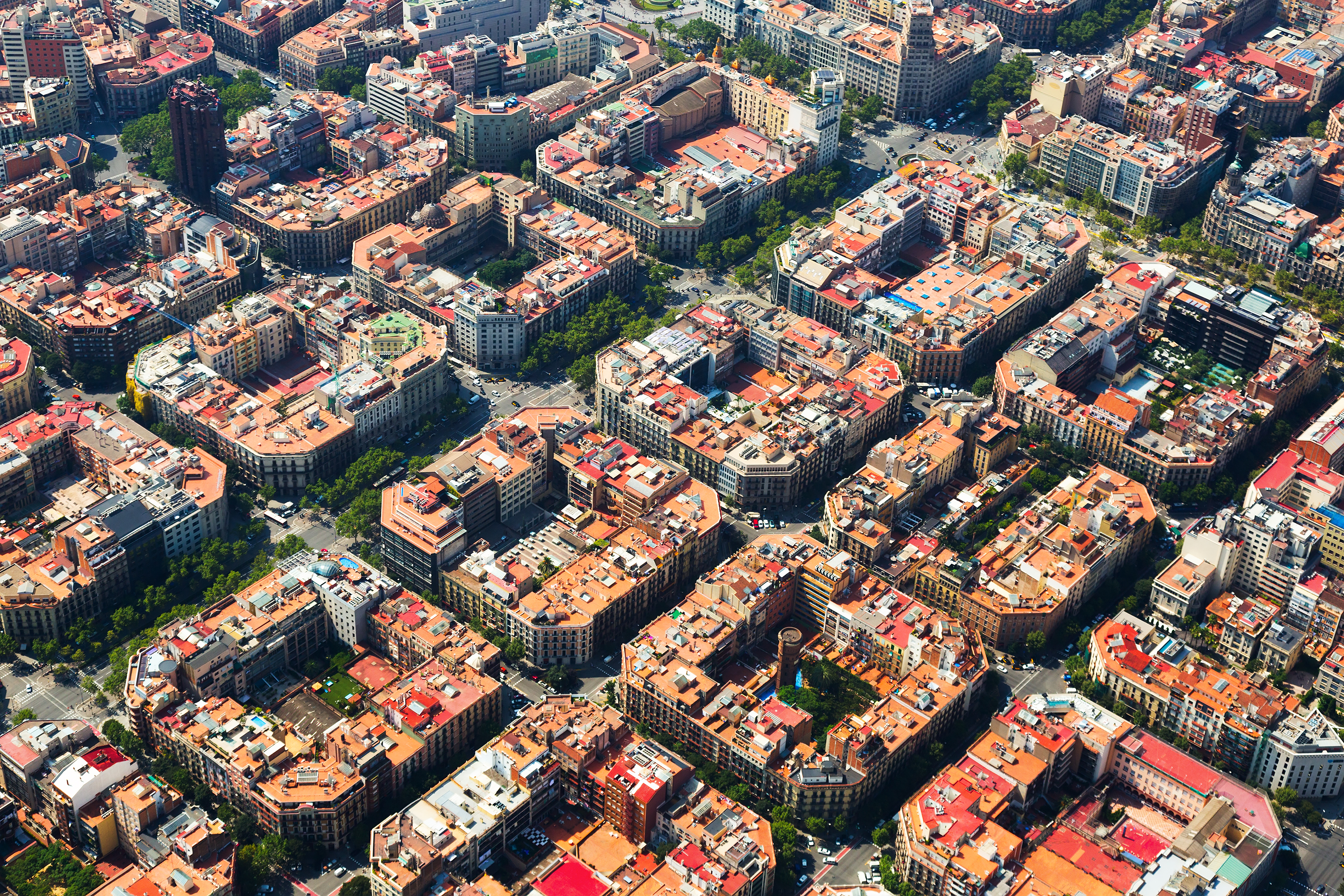 Aerial view of residence districts in european city. Eixample district. Barcelona, Spain
