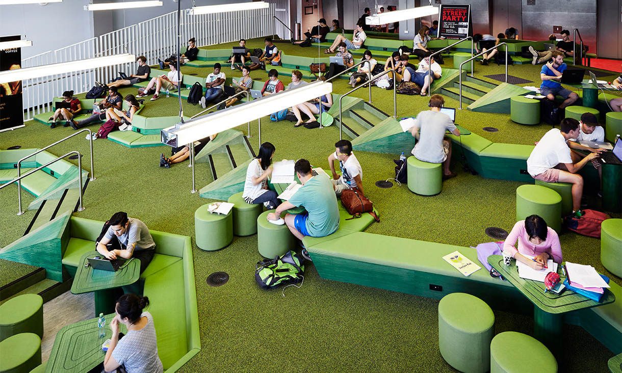 RMIT students enjoying a space in the City Campus' New Academic Street.