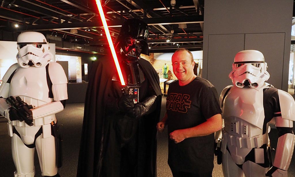 Associate Professor Brant Gibson with Darth Vader and Stormtrooper cosplayers from Star Wars