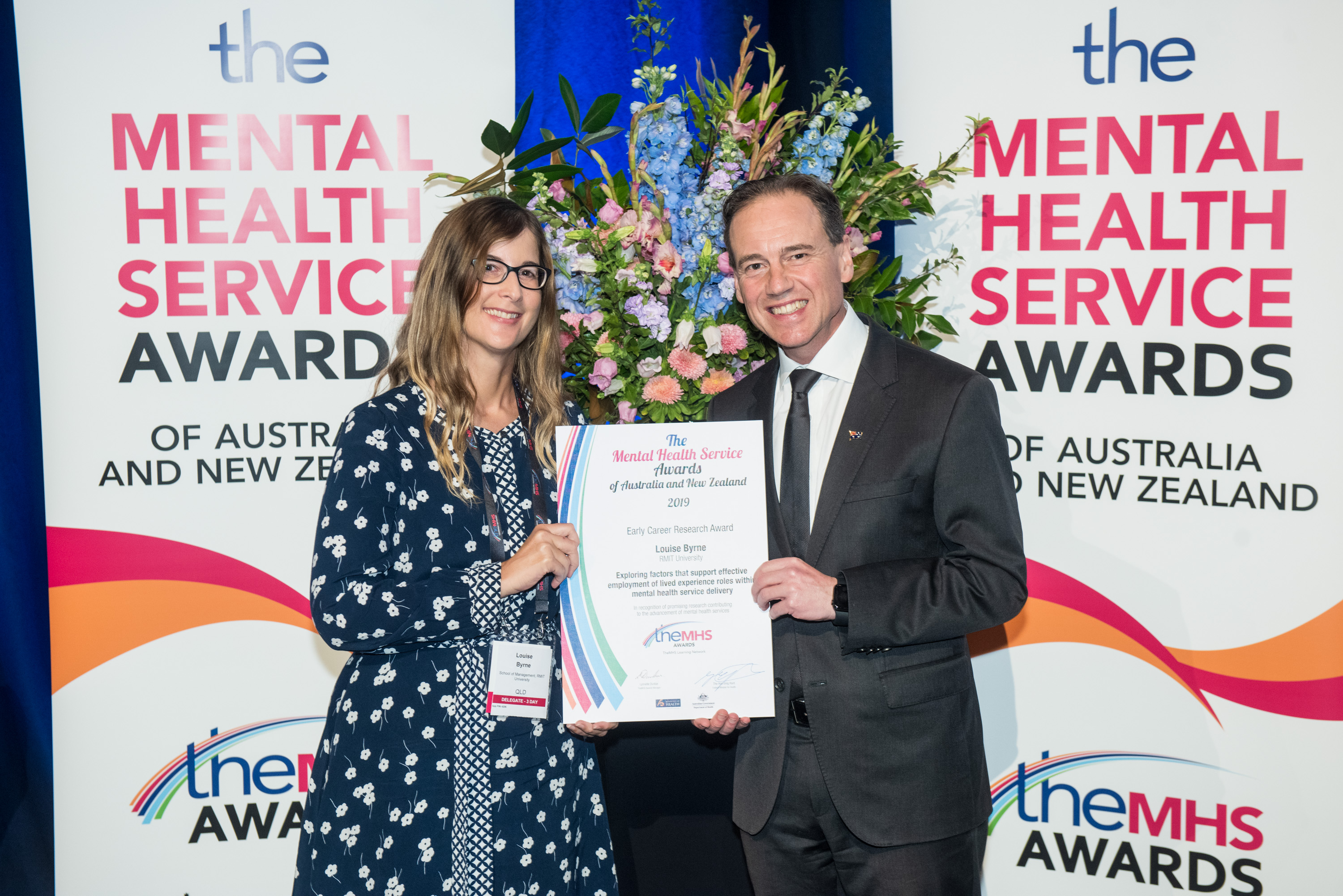 Louise Byrne receives her award from by the Hon Greg Hunt MP, Federal Minister for Health.